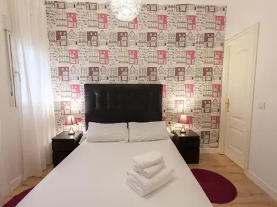 Cama o camas de una habitación en Enorme y acogedor piso en la puerta del sol