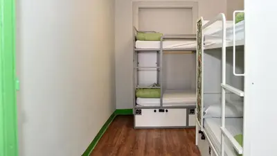 Cama o camas de una habitación en Cats Hostel Madrid Sol