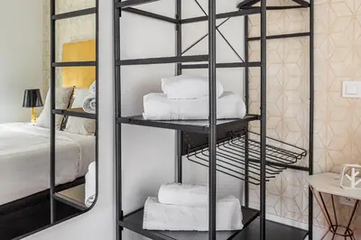 Cama o camas de una habitación en Waou Chueca I - Alquiler Corta Duración
