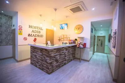 Una televisión o centro de entretenimiento en Hostal Adis