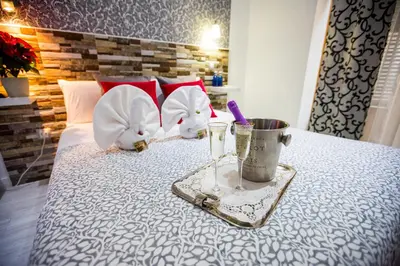 Cama o camas de una habitación en Hostal Adis