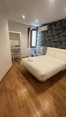 Cama o camas de una habitación en Hostal New Life Madrid