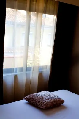 Cama o camas de una habitación en THC Tirso Molina Hostel