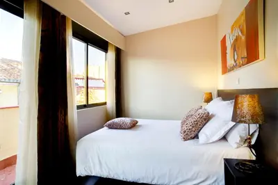 Cama o camas de una habitación en THC Tirso Molina Hostel