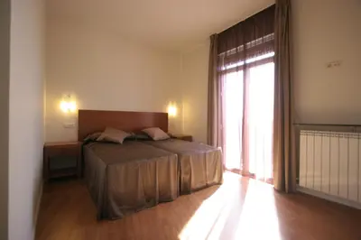 Cama o camas de una habitación en Rincón de Gran Vía