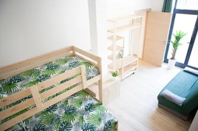 Cama o camas de una habitación en NEW LOFT ATOCHA Centre