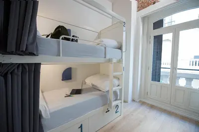 Cama o camas de una habitación en room00 Gran Vía Hostel