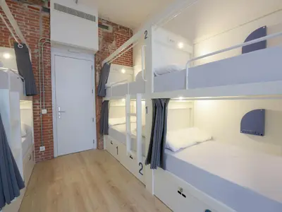 Cama o camas de una habitación en room00 Gran Vía Hostel