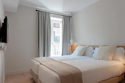 Cama o camas de una habitación en MH Apartments Central Madrid