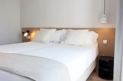 Cama o camas de una habitación en MH Apartments Central Madrid