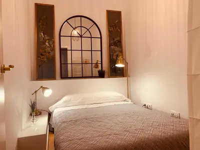 Cama o camas de una habitación en Hostal Patria Madrid