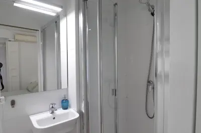 Un baño de Hostal La Zona