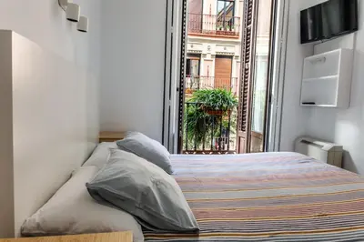Cama o camas de una habitación en Hostal La Zona