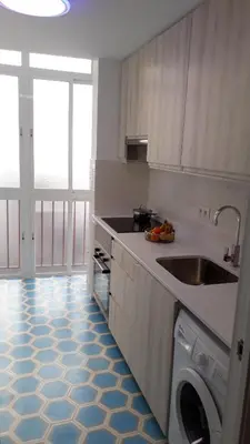 Una cocina o zona de cocina en Luminous, central, new and chic.