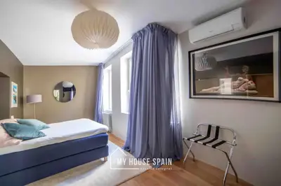 Cama o camas de una habitación en MyHouseSpain - Modern penthouse close to Gran Via - Big Terrace