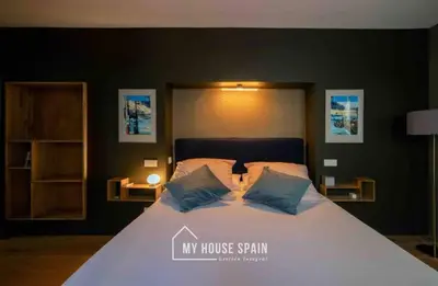 Cama o camas de una habitación en MyHouseSpain - Modern penthouse close to Gran Via - Big Terrace