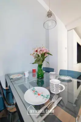 Una televisión o centro de entretenimiento en MyHouseSpain - Modern penthouse close to Gran Via - Big Terrace