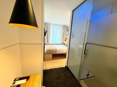 Cama o camas de una habitación en Mucho Madrid