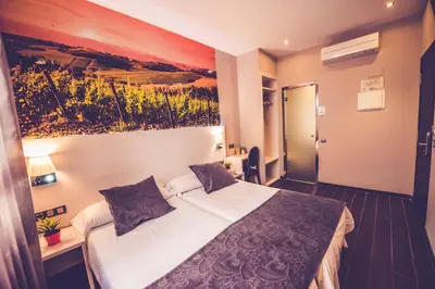 Cama o camas de una habitación en Hostal Prado