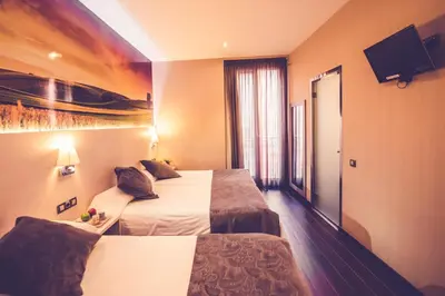 Cama o camas de una habitación en Hostal Prado