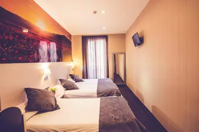 Cama o camas de una habitación en Hostal Prado
