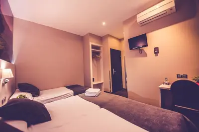 Cama o camas de una habitación en Hostal Prado