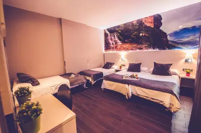 Cama o camas de una habitación en Hostal Prado