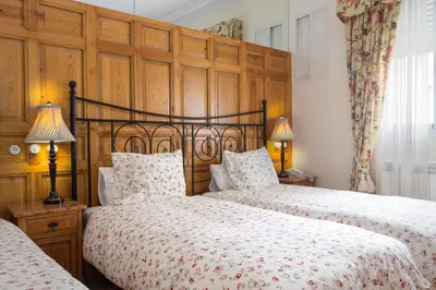 Cama o camas de una habitación en Hostal Adria Santa Ana