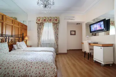 Cama o camas de una habitación en Hostal Adria Santa Ana