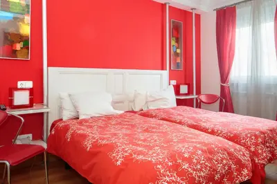 Cama o camas de una habitación en Hostal Adria Santa Ana