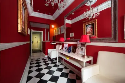 Zona de estar de Hostal Adria Santa Ana