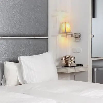 Cama o camas de una habitación en Hostal Adria Santa Ana