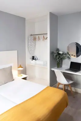 Cama o camas de una habitación en 8Rooms Madrid
