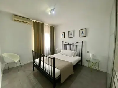Cama o camas de una habitación en CH Six Rooms