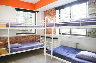 Cama o camas de una habitación en Hostels Meetingpoint
