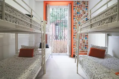 Cama o camas de una habitación en Hostels Meetingpoint
