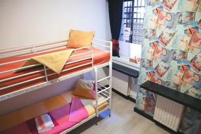 Cama o camas de una habitación en Hostels Meetingpoint