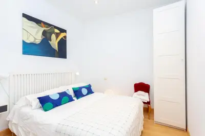 Cama o camas de una habitación en Apartamentos Esperanza