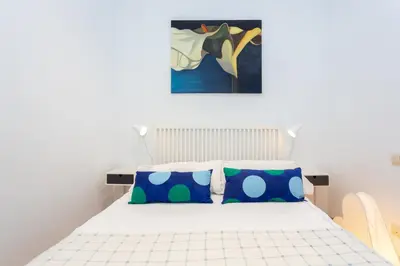 Cama o camas de una habitación en Apartamentos Esperanza