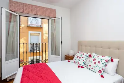 Cama o camas de una habitación en Apartamentos Esperanza