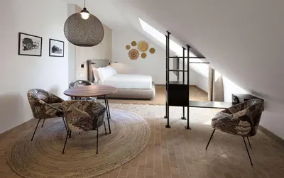 Cama o camas de una habitación en Atocha Hotel Madrid, Tapestry Collection by Hilton