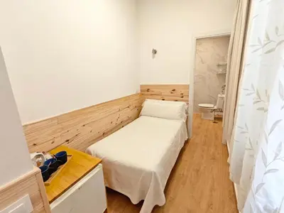 Cama o camas de una habitación en Hostal Aliste