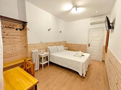 Cama o camas de una habitación en Hostal Aliste