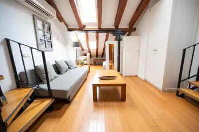 Zona de estar de Apartamentos Huertas