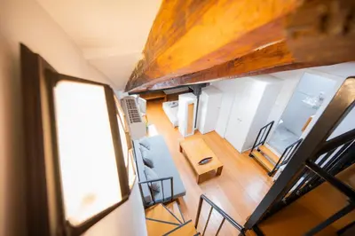 Zona de estar de Apartamentos Huertas