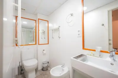 Un baño de Apartamentos Huertas