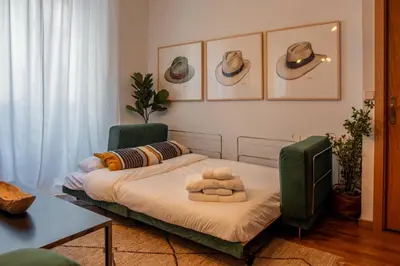 Cama o camas de una habitación en Apartamento moderno junto a la Gran Via