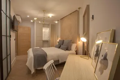 Cama o camas de una habitación en SUITES YOU Soho