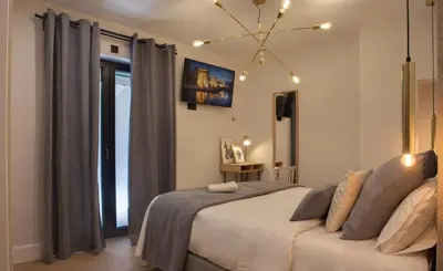 Cama o camas de una habitación en SUITES YOU Soho