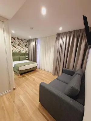 Cama o camas de una habitación en Hostal San Blas